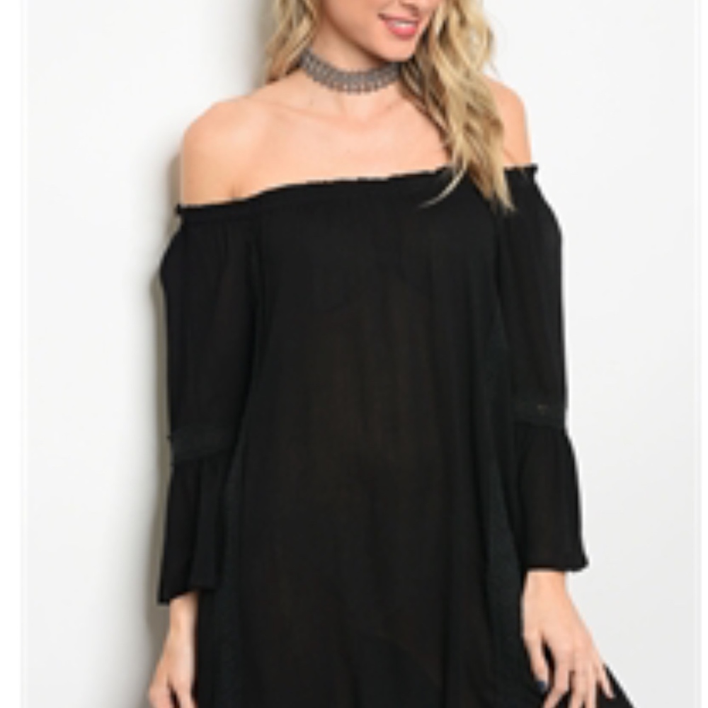 Beautiful lace trim and Flute sleeve mini dress